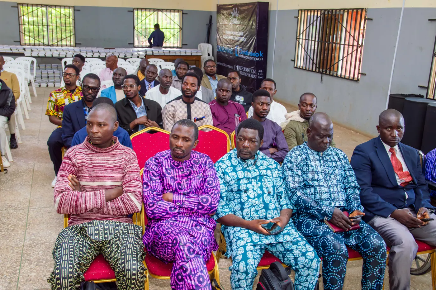 Participants listening at the Jos conference, July 2025